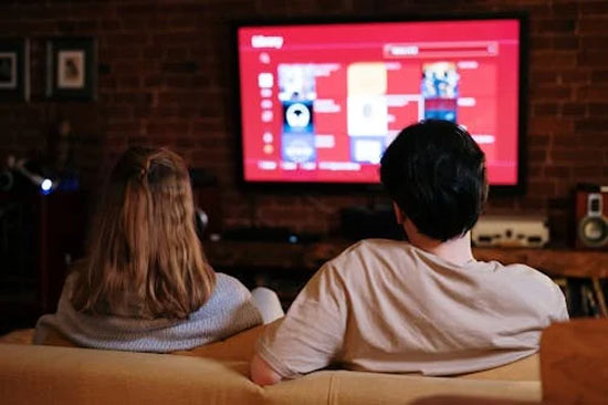 People watching horror at home
